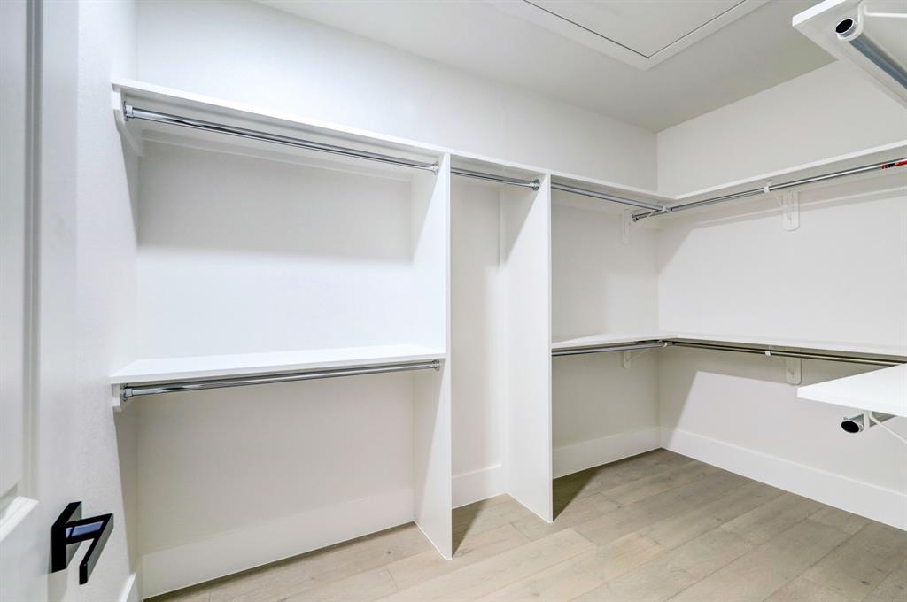 Expansive walk-in closet in the primary bedroom