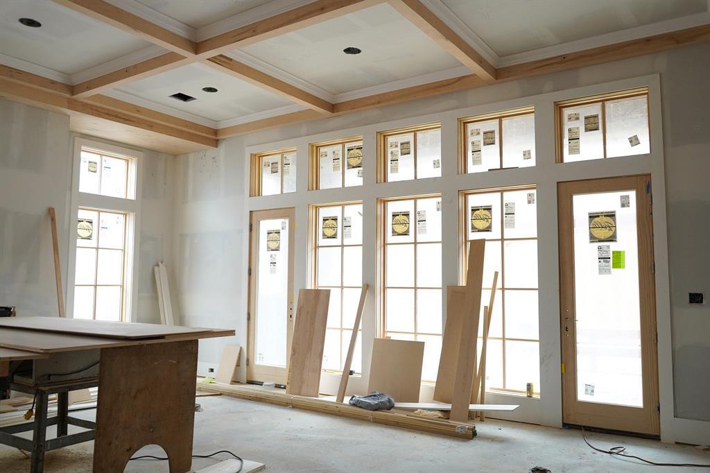 Construction Progress - 2/10/2024 - Living room with traditional millwork design elements