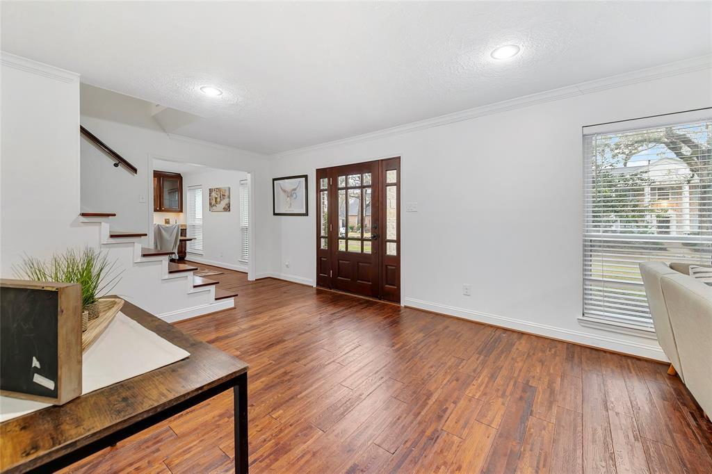 Spacious foyer with the formal dining room to the left and a wonderful family room to the right!